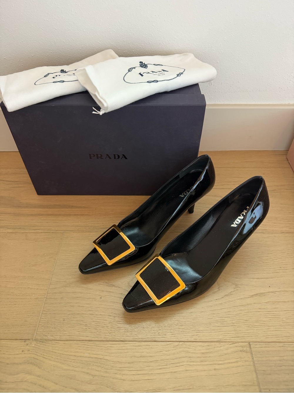 Prada Black Patent Leather Pointed Toe Pumps with Gold-Tone Square Buckles